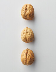top view shot of walnut on white background.