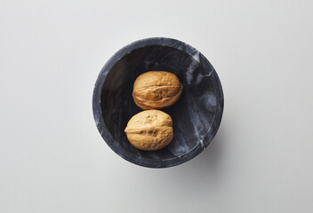 top view shot of walnut on white background.