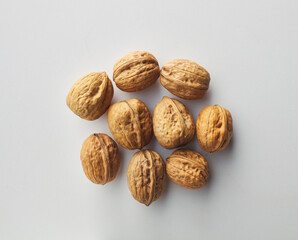 top view shot of walnut on white background.