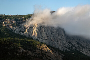 Beautiful clouds on top of a mountain in Crimea