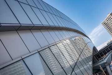 Fototapeta na wymiar Low Angle View Of Modern Buildings Against Clear Blue Sky