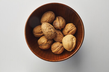 top view shot of walnut on white background.