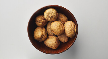 top view shot of walnut on white background.