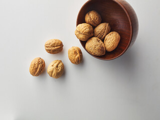 top view shot of walnut on white background.