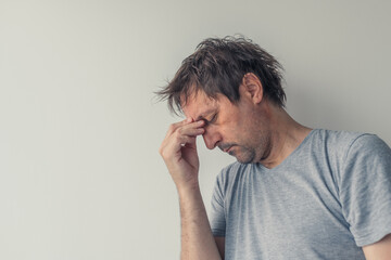 Man with headache,viral infection symptoms