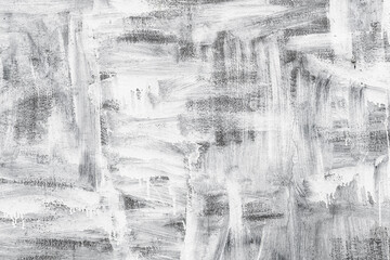 Smudged white paint pattern on the wall