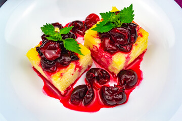 Cottage cheese casserole decorated with cherries