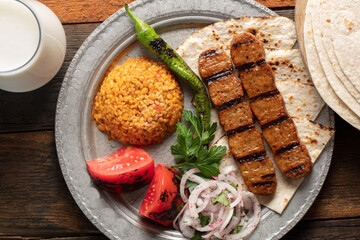 Turkish Adana Kebab with Vegetables on the Plate