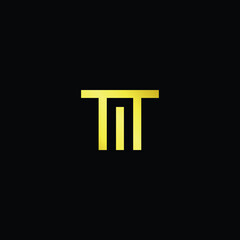 Minimal elegant monogram art logo. Outstanding professional trendy awesome artistic TM MT initial based Alphabet icon logo. Premium Business logo gold color on black background