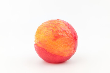 Red plums on white background