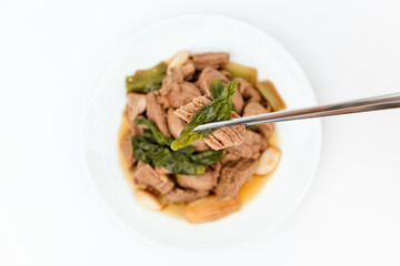 Stewed pork on a white background