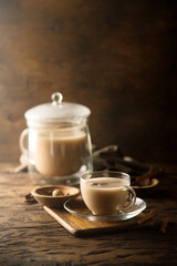 Obraz na płótnie Canvas Homemade milk tea or chai with spices