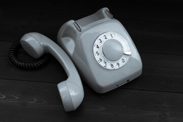 Disc phone on wooden background
