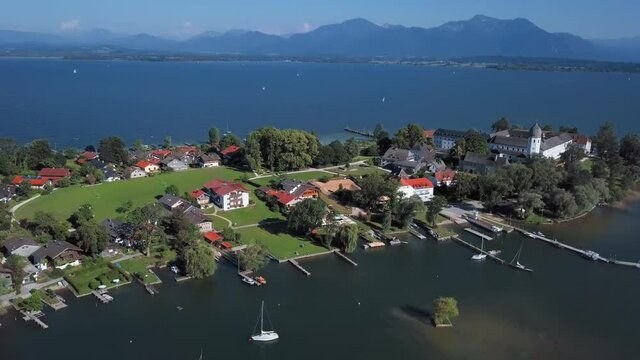 Aerial panorama of Frauenchiemsee island (Fraueninsel) in Chiemsee lake, Bavaria, Germany.