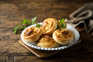 Homemade cheese buns with herbs
