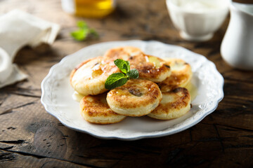 Homemade cottage cheese cakes with honey