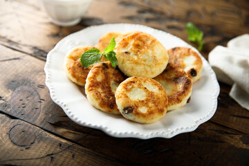 Homemade cottage cheese cakes with honey