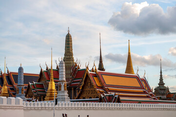 The Grand Palace and Wat Phra Kaew A view from the outside on a clear day in Bangkok, Thailand