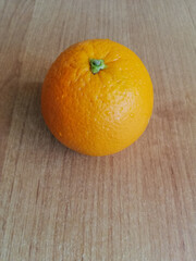 orange on wooden background