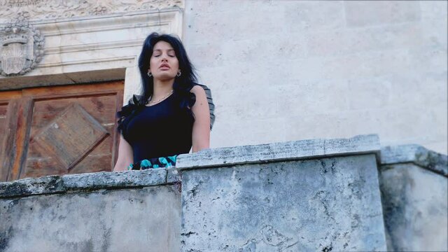 steady cam on lonely pensive woman overlooking from janiculum terrace 