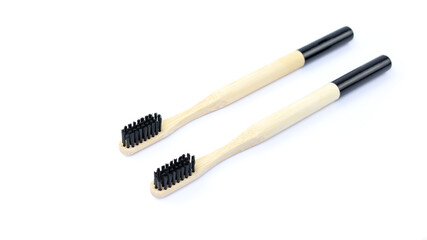 Wooden toothbrushes on a white background