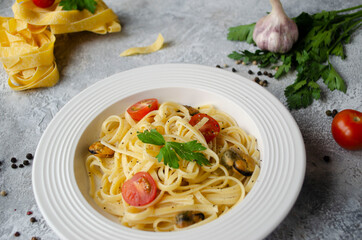 pasta with tomato sauce and seafood