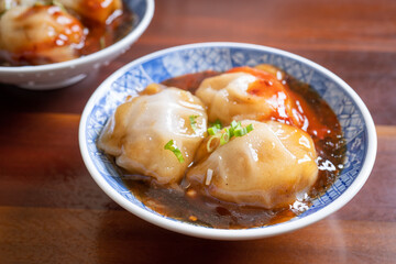 Bawan (Ba wan), Taiwanese meatball delicacy, delicious street food, steamed starch wrapped round shaped dumpling with pork inside, close up, copy space