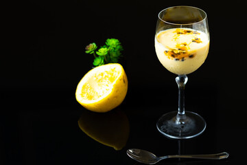 passion fruit mousse with champagne in a glass bowl