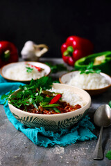 Chili con carne in ceramic bowl.style rustic