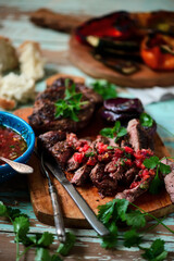 Grilled steak with chimichurri sauce..selective focus.