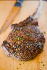 Steak. Grass-fed skirt steak, grilled to a medium rare and served with a garlic herb butter sauce and paired with roasted potatoes and Brussels sprouts. Classic American steakhouse favorite.