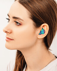Personally molded earplugs for use in an airplane at high atmospheric pressure with pressure valve....