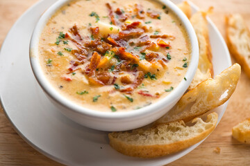 Soups. Homemade savory beef or chicken stock soups. Traditional classic american restaurant menu favorite. Bacon cheddar soups and chicken vegetable. 