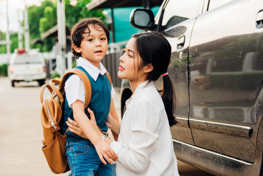 Happy Asian Family Mother Mom Send Children Kid Son Boy Kindergarten Sidewalk To The School Bus, Education Back, Back To School First Day Of Semester Concept