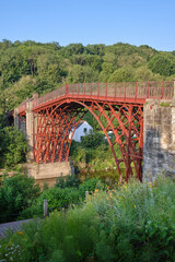 The Iron Bridge, the world's first iron bridge, spanning the River Severn in Ironbridge,...