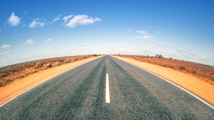 Road in Australia with curved horizon
