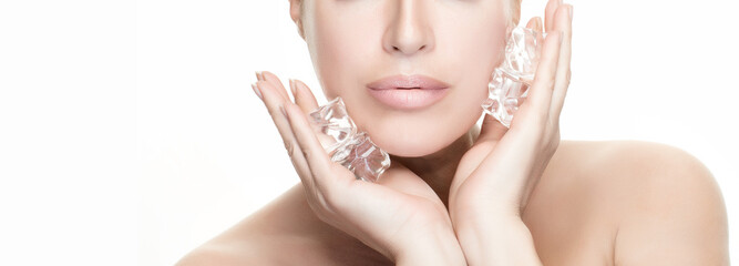 Spa Face Woman applies ice cubes on face. Healthy clean skin. Cold Beauty Treatments