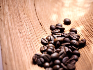 Coffee beans in a bag on wooden background , Coffee time