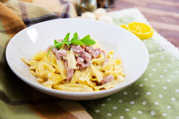 tasty Carbonara pasta on the table
