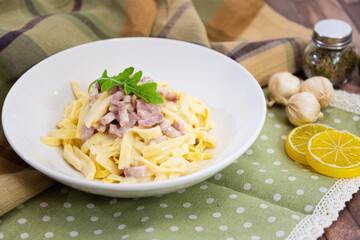 tasty Carbonara pasta on the table