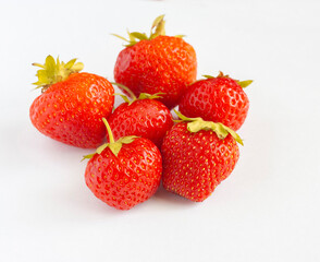 Six strawberries isolated on a white background