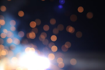 Obraz premium Gold abstract bokeh background, Festive xmas abstract background with bokeh defocused lights and stars