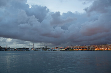Naklejka na ściany i meble Cloudy moody sky in Valencia Harbour