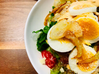 Bacon and Eggs salad for helath food concept backgrounds above