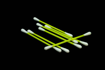 Cotton swabs isolated on black background