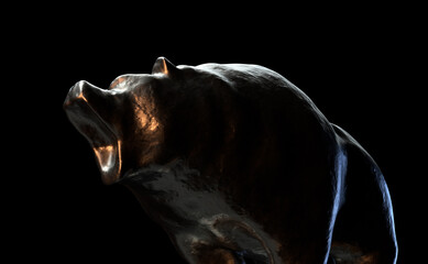 A metal casting depicting a bear in dark dramatic light representing opposing financial market trends - 3D render
