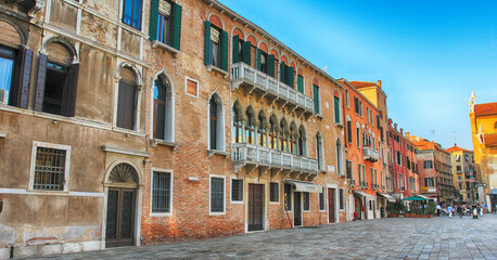 Fototapeta na wymiar The old colorful residential buildings of the floating city - Venice, Italy
