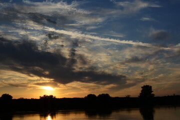 Fototapeta premium sunset over the river