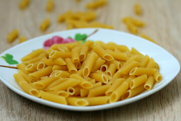 Macaroni products lying in a beautiful plate