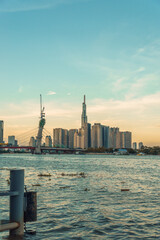 Naklejka premium skyline with landmark 81 skyscraper, a new cable-stayed bridge is building connecting Thu Thiem peninsula and District 1 across the Saigon River.